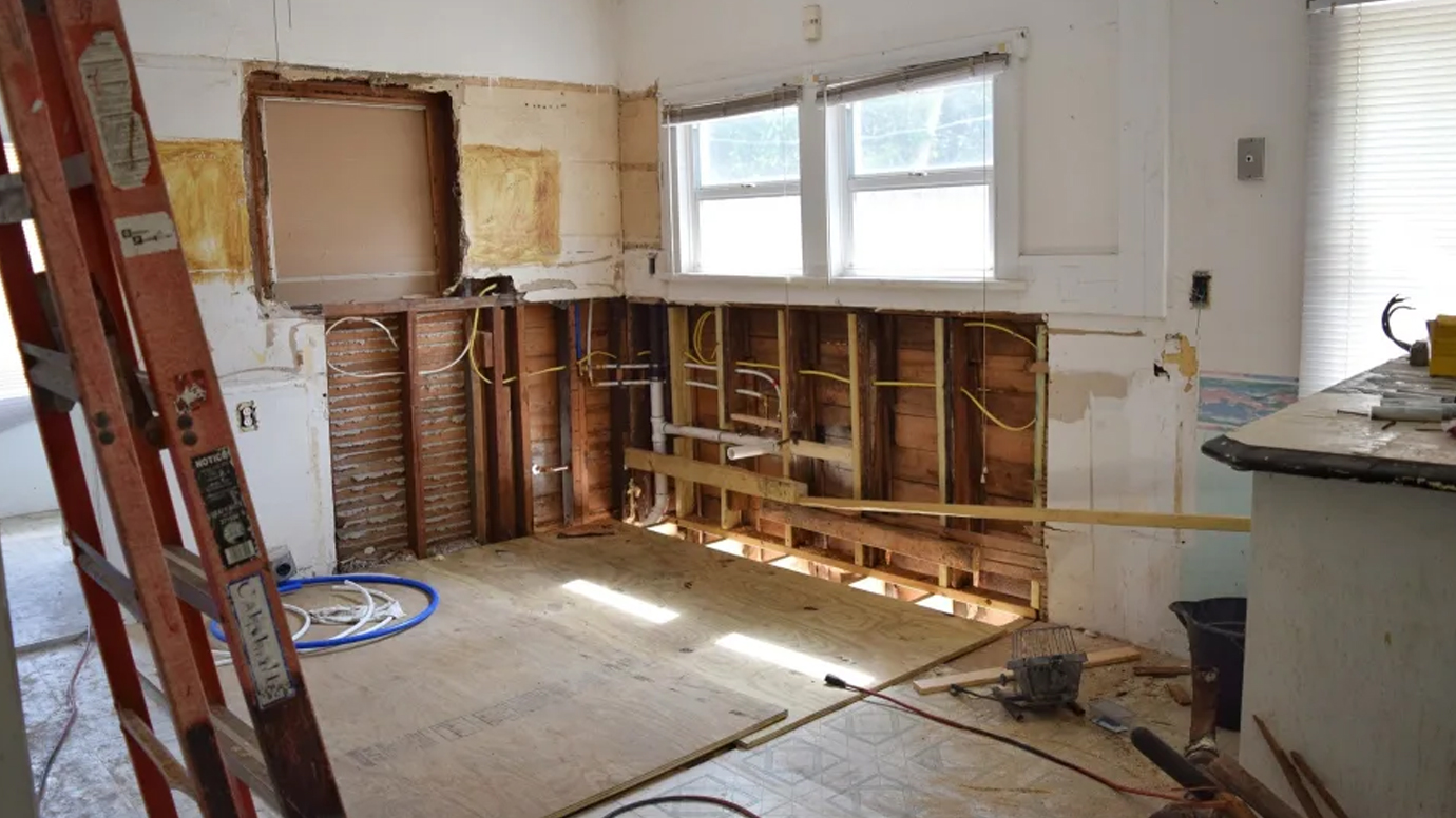 A room inside a home has been taken down to the studs to make repairs.